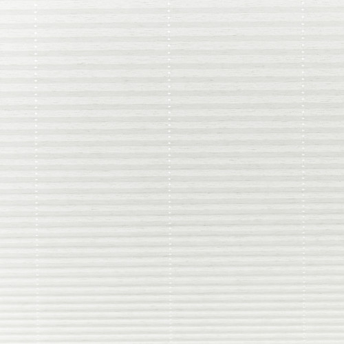 White pleated cellular blinds, fully lowered across the window with three vertical beaded cord ladders, closed and diffusing soft daylight into a neutral, minimally furnished interior.