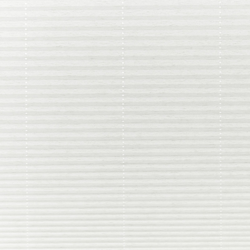 White pleated cellular blinds, fully lowered across the window with three vertical beaded cord ladders, closed and diffusing soft daylight into a neutral, minimally furnished interior.