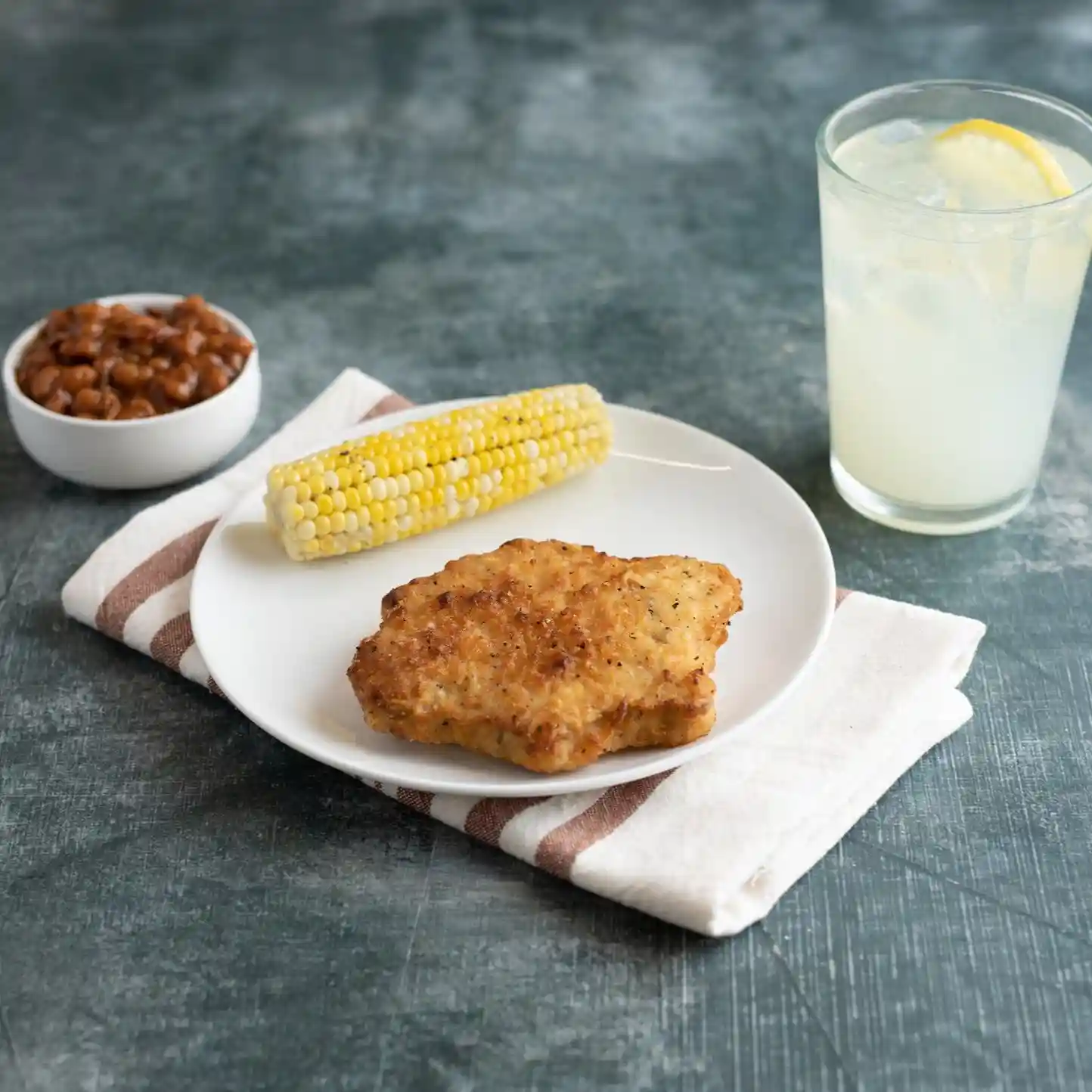AdvancePierre™ Blue Label Reduced Sodium Fully Cooked Breaded Country Fried Beef Steak https://images.salsify.com/image/upload/s--VDf2Vf5Q--/q_25/lxhnngvwulbznktenf8u.webp
