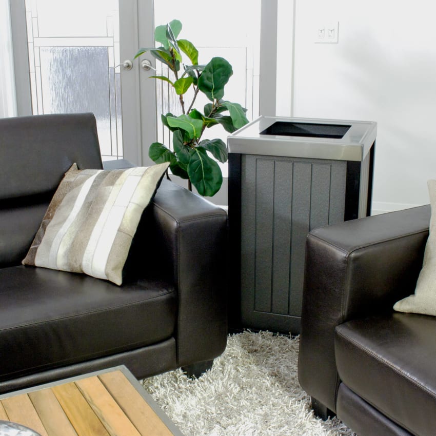 recycled lumber waste container with a stainless steel lid in an office lounge