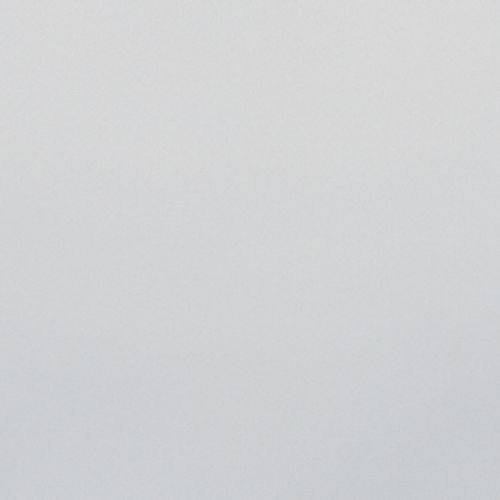 Light-gray textured wall occupying the frame, appearing blank and unadorned; evenly lit by soft, diffuse light with no visible furniture or other features.