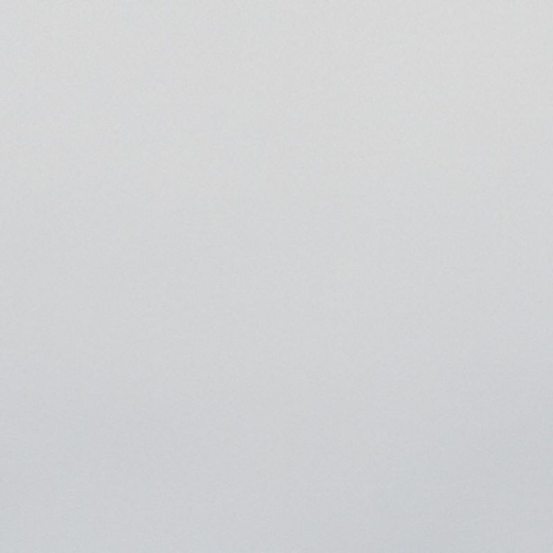 Light-gray textured wall occupying the frame, appearing blank and unadorned; evenly lit by soft, diffuse light with no visible furniture or other features.