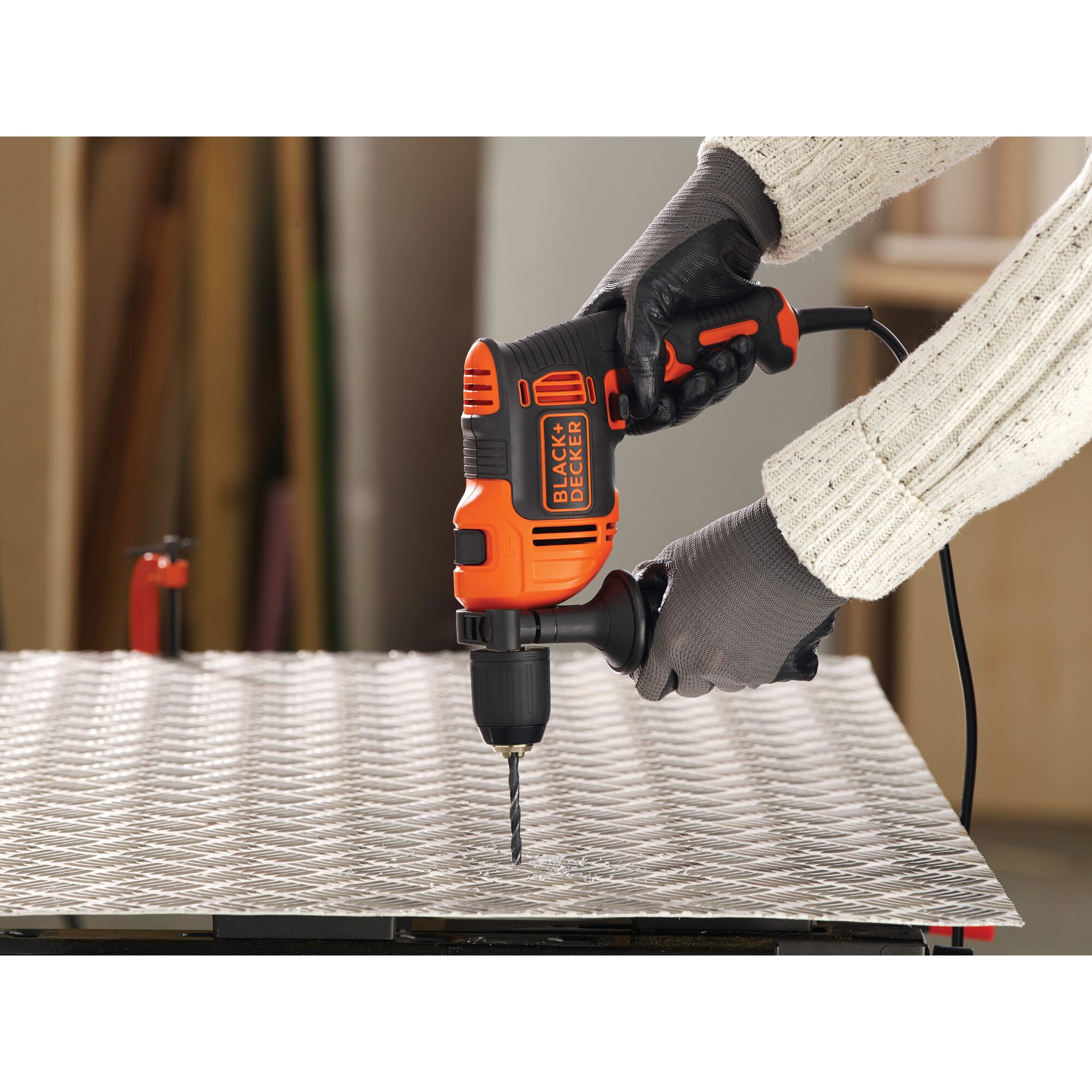 6.5 Amp half inch Hammer Drill being used for drilling.