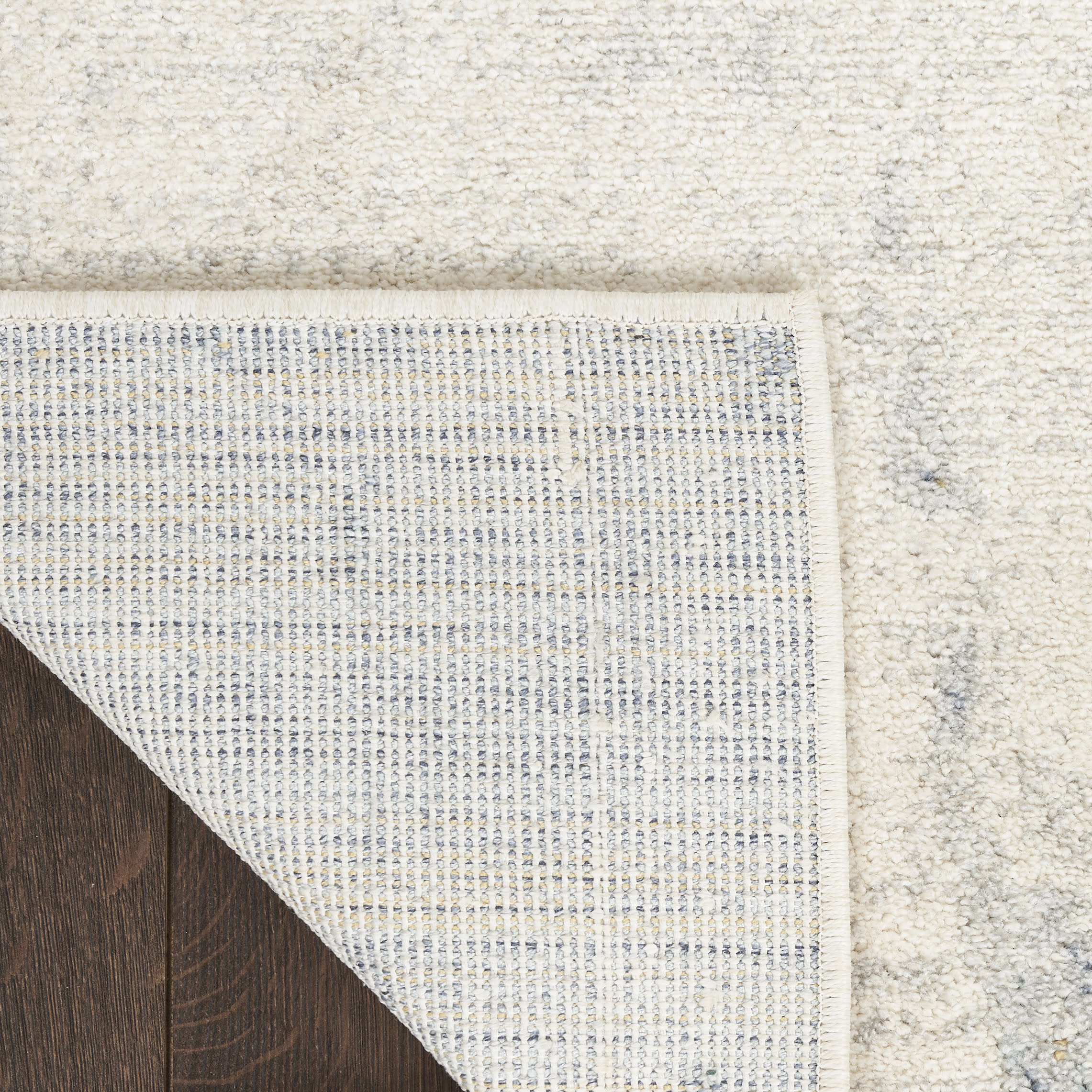 Nourison Motion 5'3" x 7' Ivory Blue Modern Indoor Rug