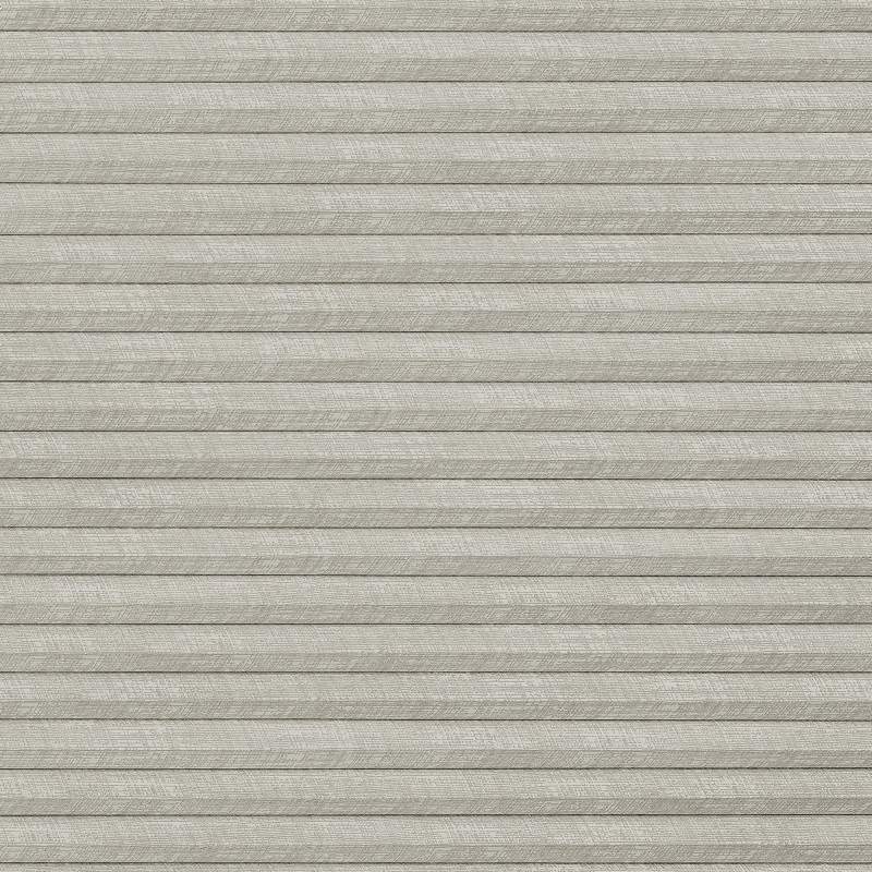 Light-gray textured pleated cellular shades, fully closed across the frame, blocking view and softly diffusing light; neutral interior setting with even, muted lighting and no visible furnishings.