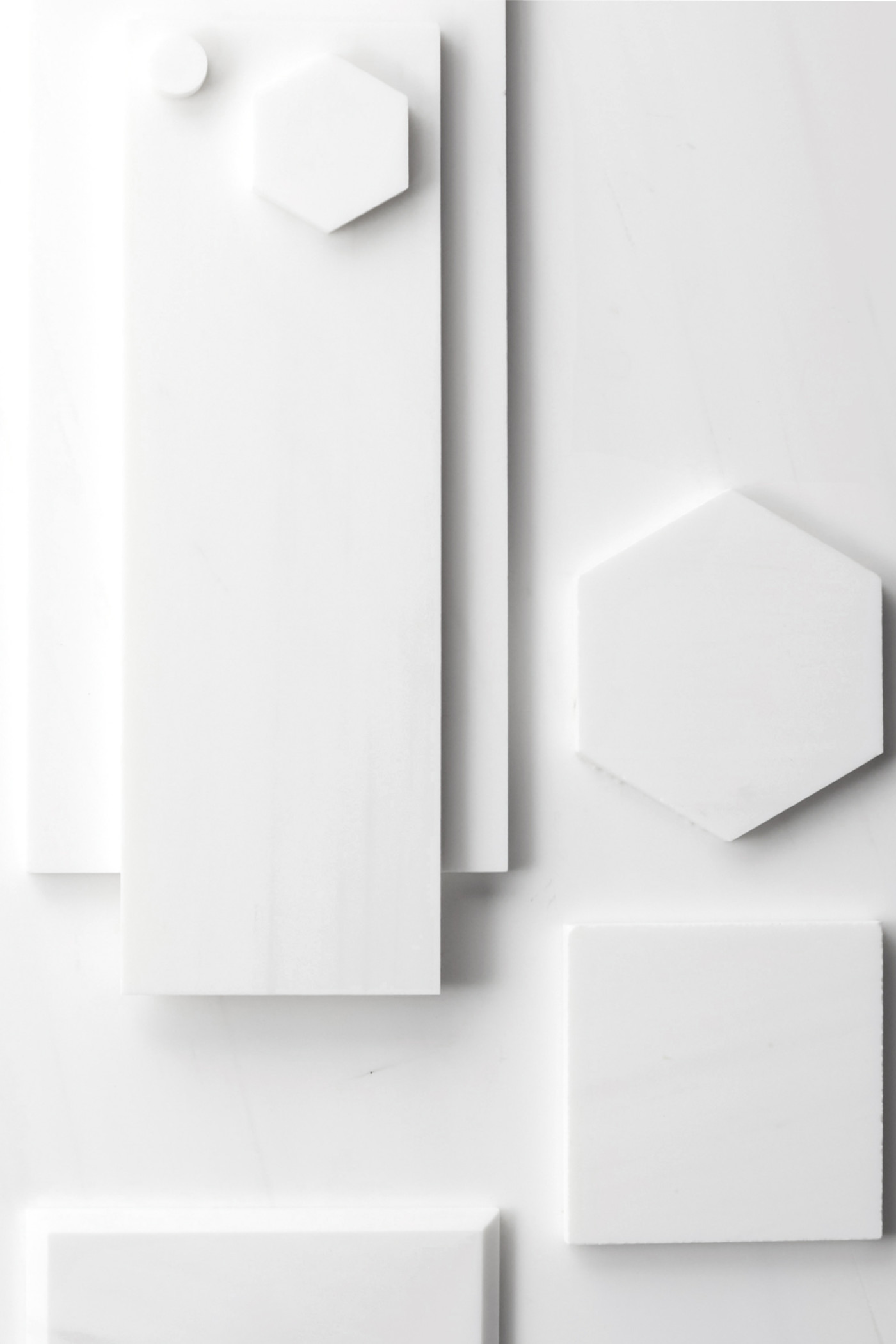 various white tiles on a white background.