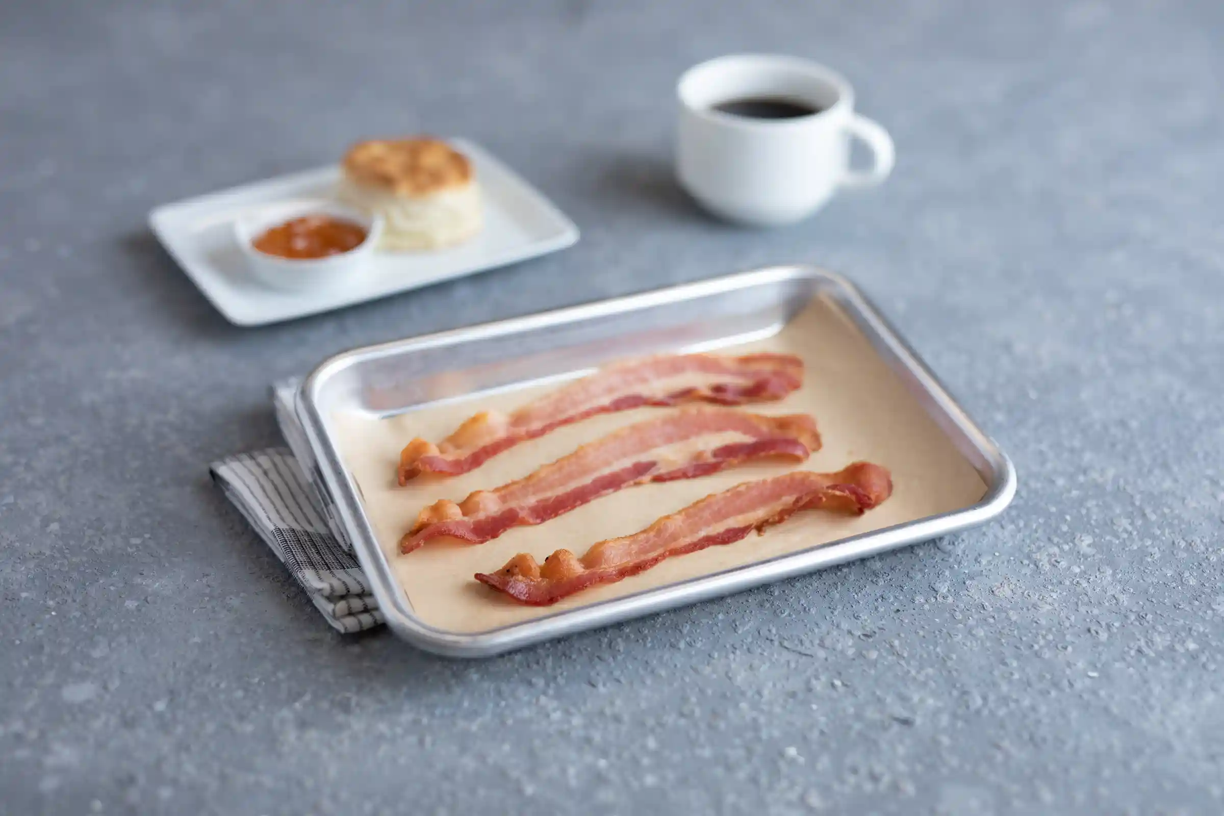 Wright® Brand Naturally Applewood Smoked Thin Sliced Bacon, Flat-Pack®, 15Lbs, 18-22 Slices per pound, Gas Flushed https://images.salsify.com/image/upload/s--7ys6AyGy--/q_25/asdoqfwubtjfixkcxh9h.webp