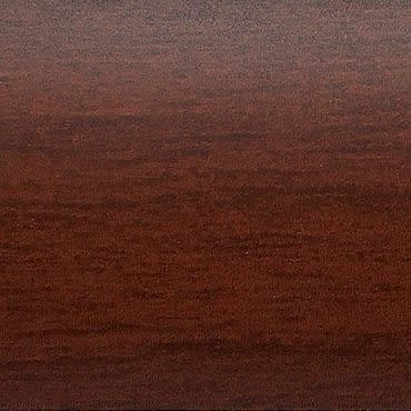 Dark reddish-brown wood surface (veneer) occupying the frame, showing fine horizontal grain and subtle sheen; flat tabletop under warm, diffuse lighting.