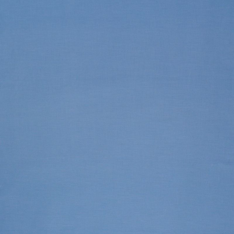 Light-blue woven roller blind, fully lowered and smooth, filtering soft diffuse daylight and obscuring the window; surrounding interior minimally visible with even, muted lighting.