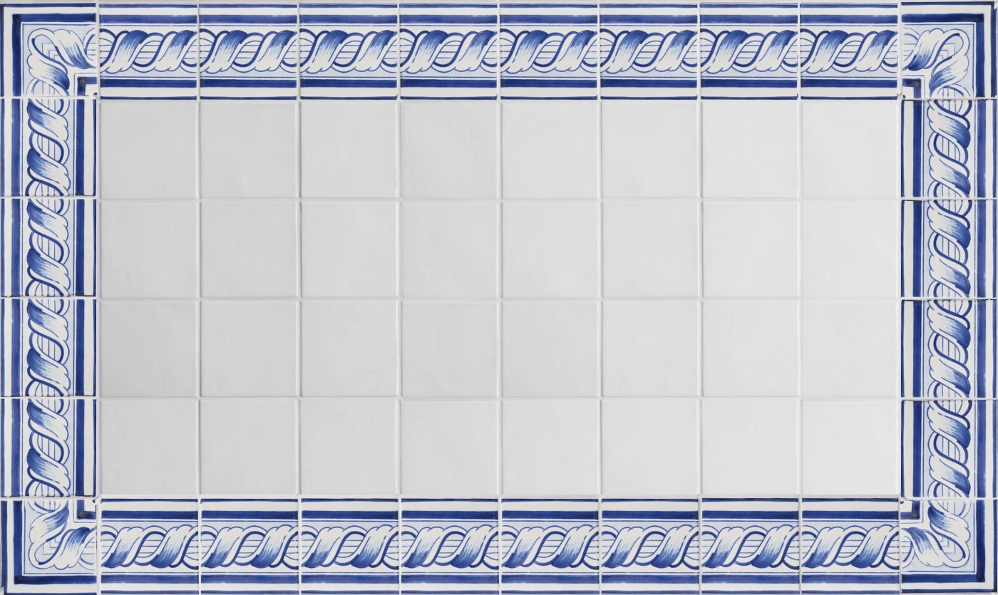 blue and white tiles arranged in an ornamental border pattern.