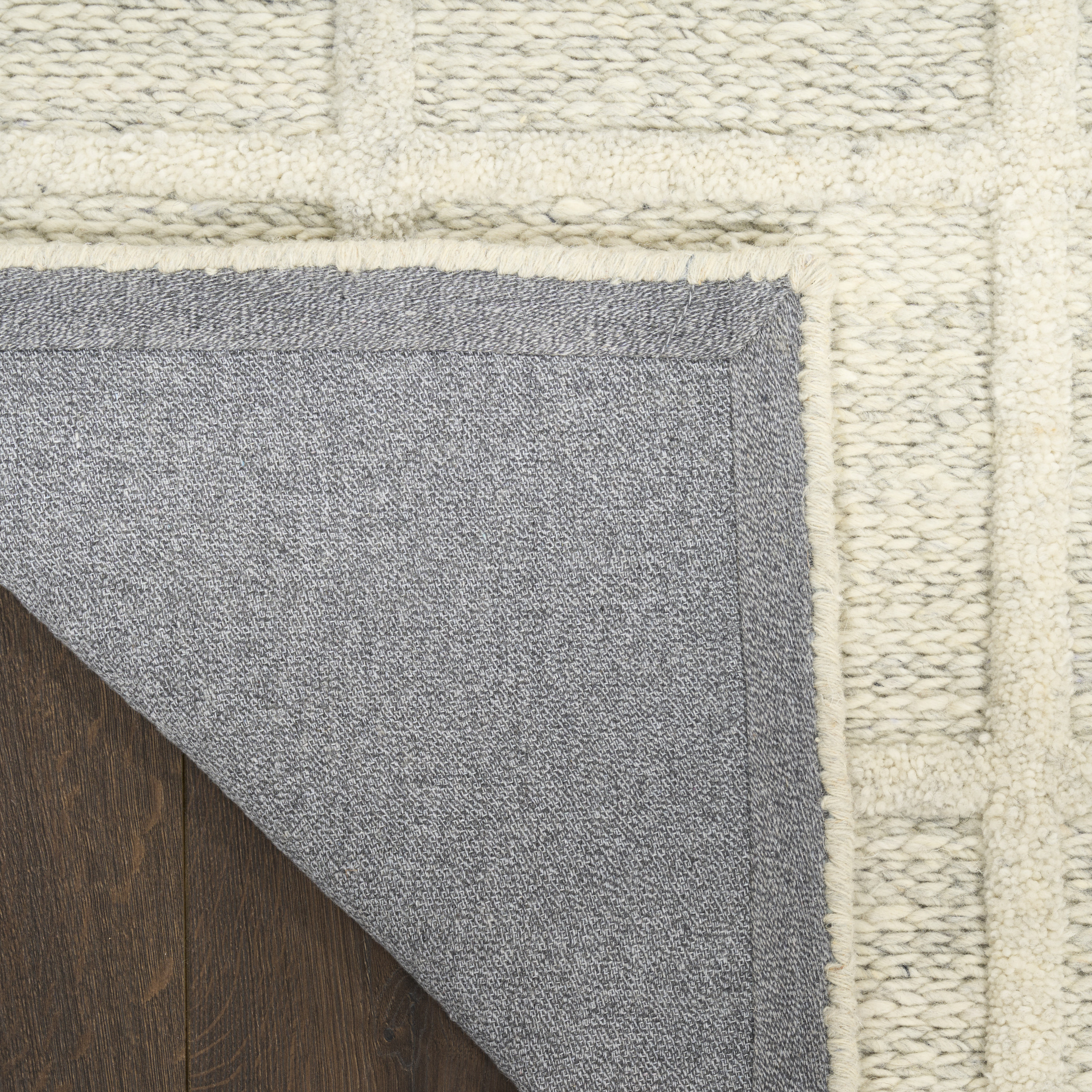 DKNY Pure Framework 2' x 3' Ivory Modern Indoor Rug
