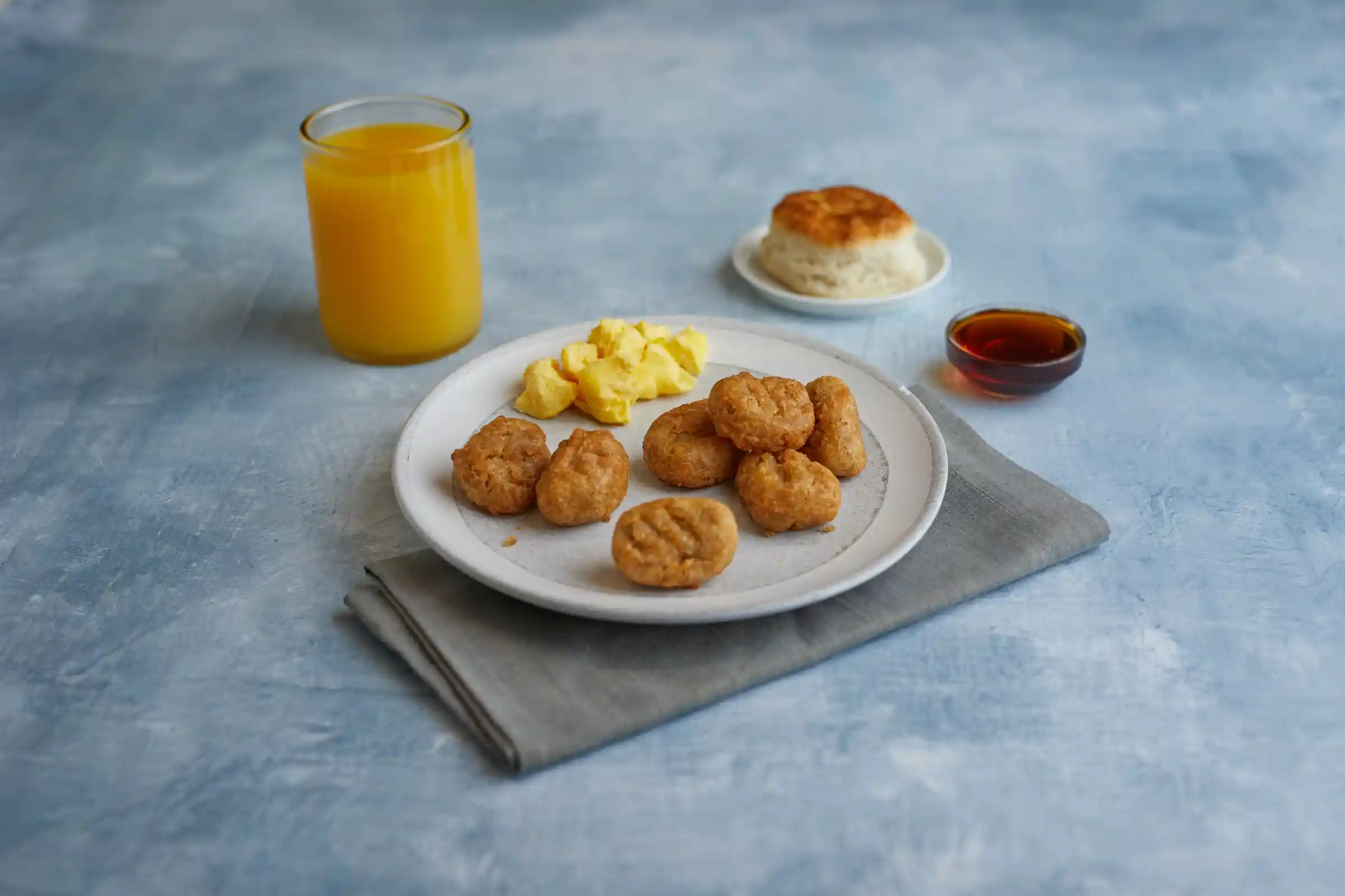 Tyson® Fully Cooked, Whole Grain Breaded, Pancake Flavored Chicken Sausage Bites, 0.58 oz. https://images.salsify.com/image/upload/s--zS1kPOmm--/q_25/dbb764df020d3d78abfa7b344d5c64b07b71a3bf.webp