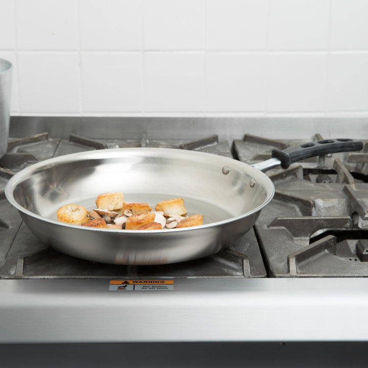 12-inch Tribute® 3-ply fry pan with natural finish and TriVent silicone handle