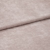 Plush blush-pink textured fabric, shown folded with one overlapping edge and visible nap, resting flat; close-up, evenly lit view emphasizing soft pile and subtle sheen.