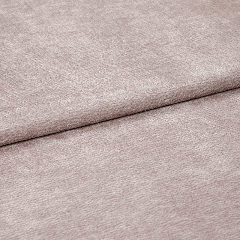 Plush blush-pink textured fabric, shown folded with one overlapping edge and visible nap, resting flat; close-up, evenly lit view emphasizing soft pile and subtle sheen.