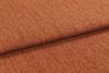 Burnt-orange textured fabric (upholstery cloth) folded once, overlapping edge casting a soft shadow; close-up studio view highlighting its nubby weave and warm, evenly lit surface.
