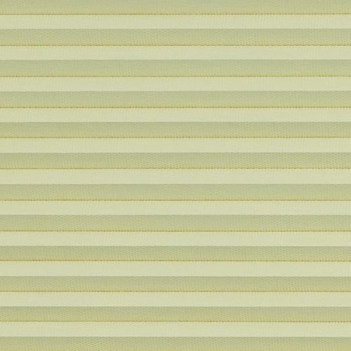 Honeycomb cellular blind with horizontal pleats, fully lowered and closed, diffusing soft daylight; close-up interior view showing uniform pale-yellow bands filling the frame.