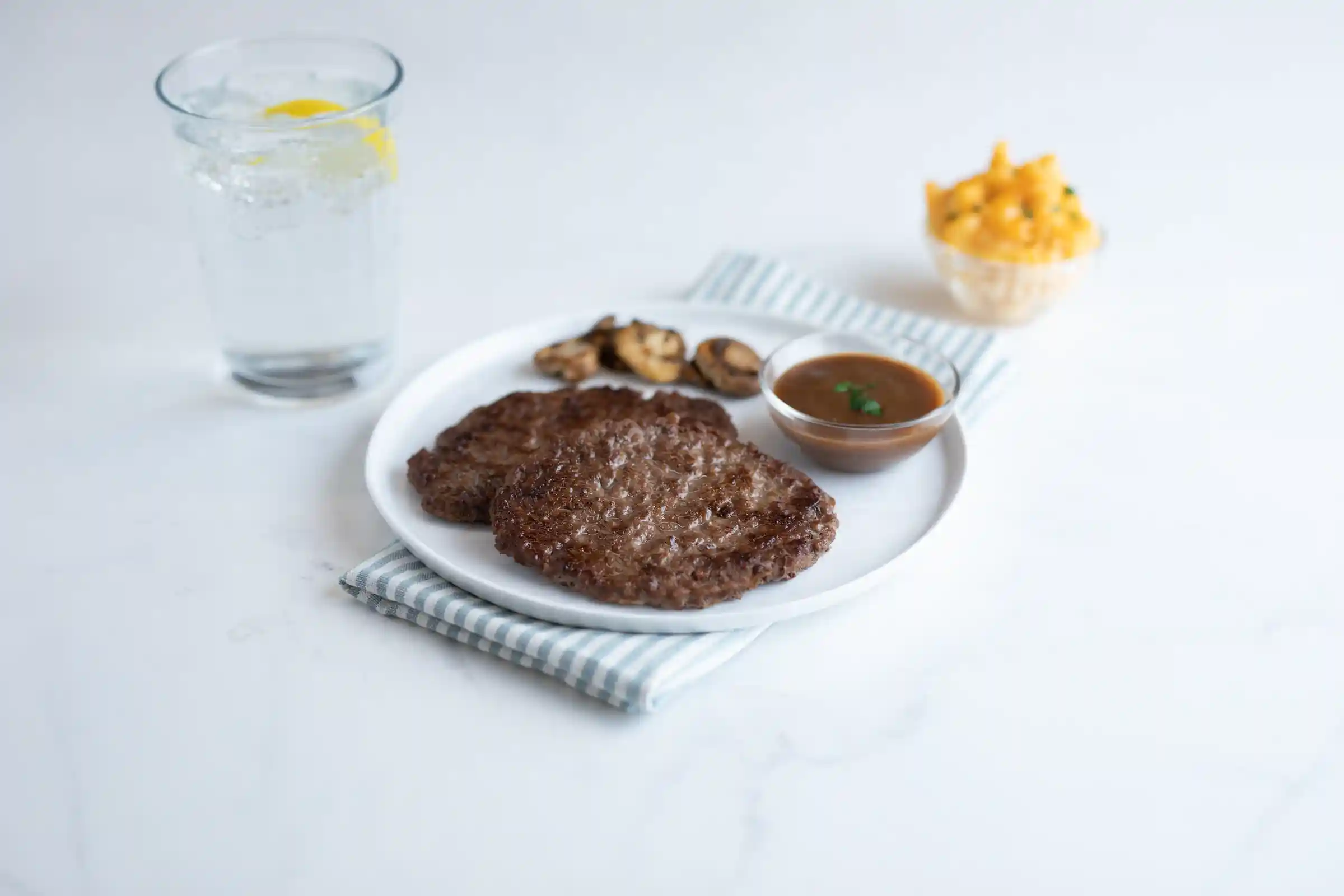 AdvancePierre™ Raw Green Bell Pepper, Onion, Spice and Beef Salisbury Patties, 3 oz. https://images.salsify.com/image/upload/s--IK3UkaRl--/q_25/nwmwoez8bnotkvw5smc6.webp