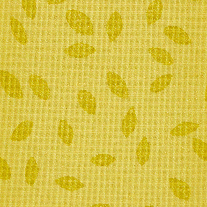 Yellow woven curtain panel, hung flat and showing scattered darker-yellow leaf motifs on a coarse textured weave; close-up interior textile detail, evenly lit with no visible window.
