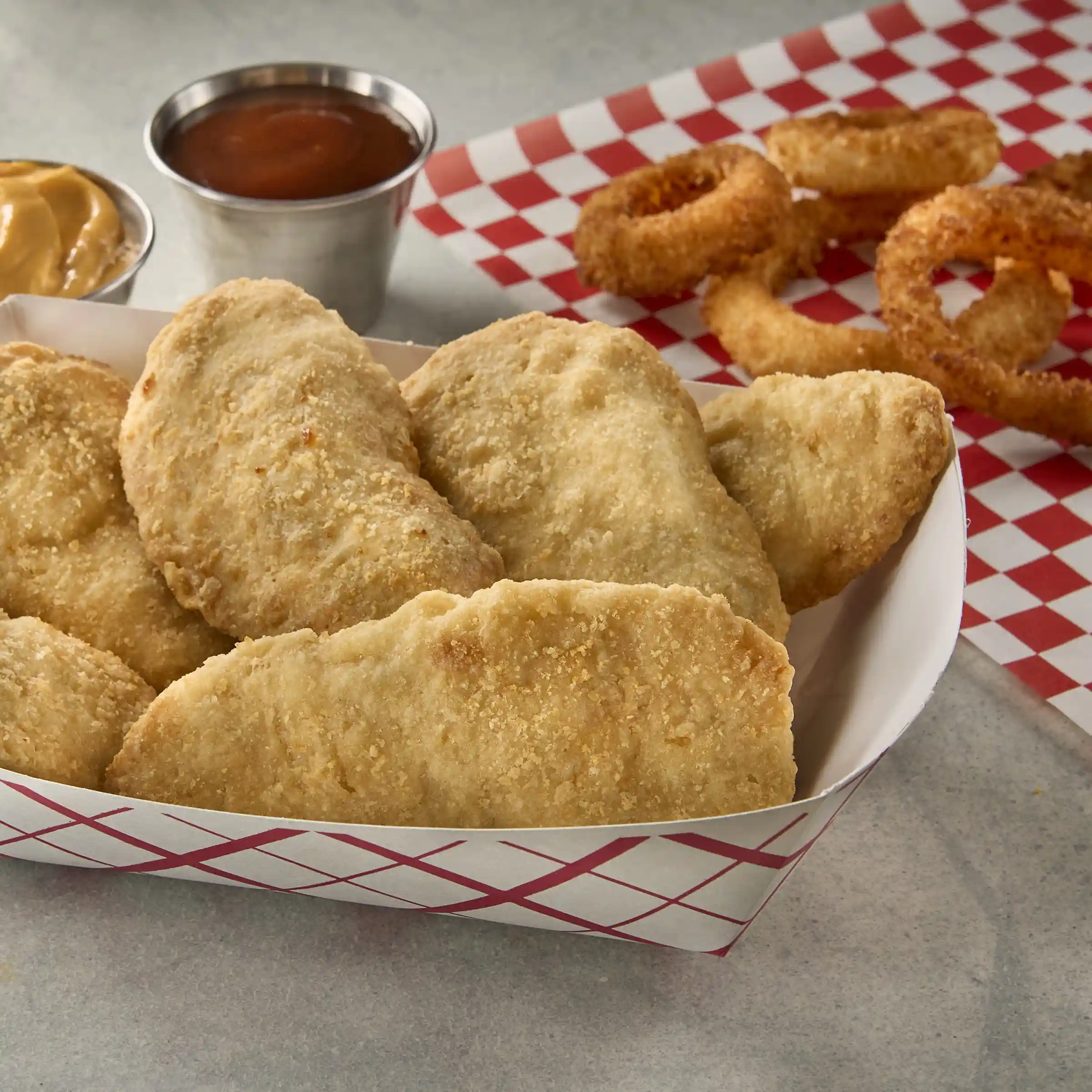Tyson® Ideal Tenders® Uncooked Select Cut Chicken Tender Fritters https://images.salsify.com/image/upload/s--13_IXskJ--/q_25/c16b6a7eb73e691a8a3f1c119ecef58d2679eabd.webp