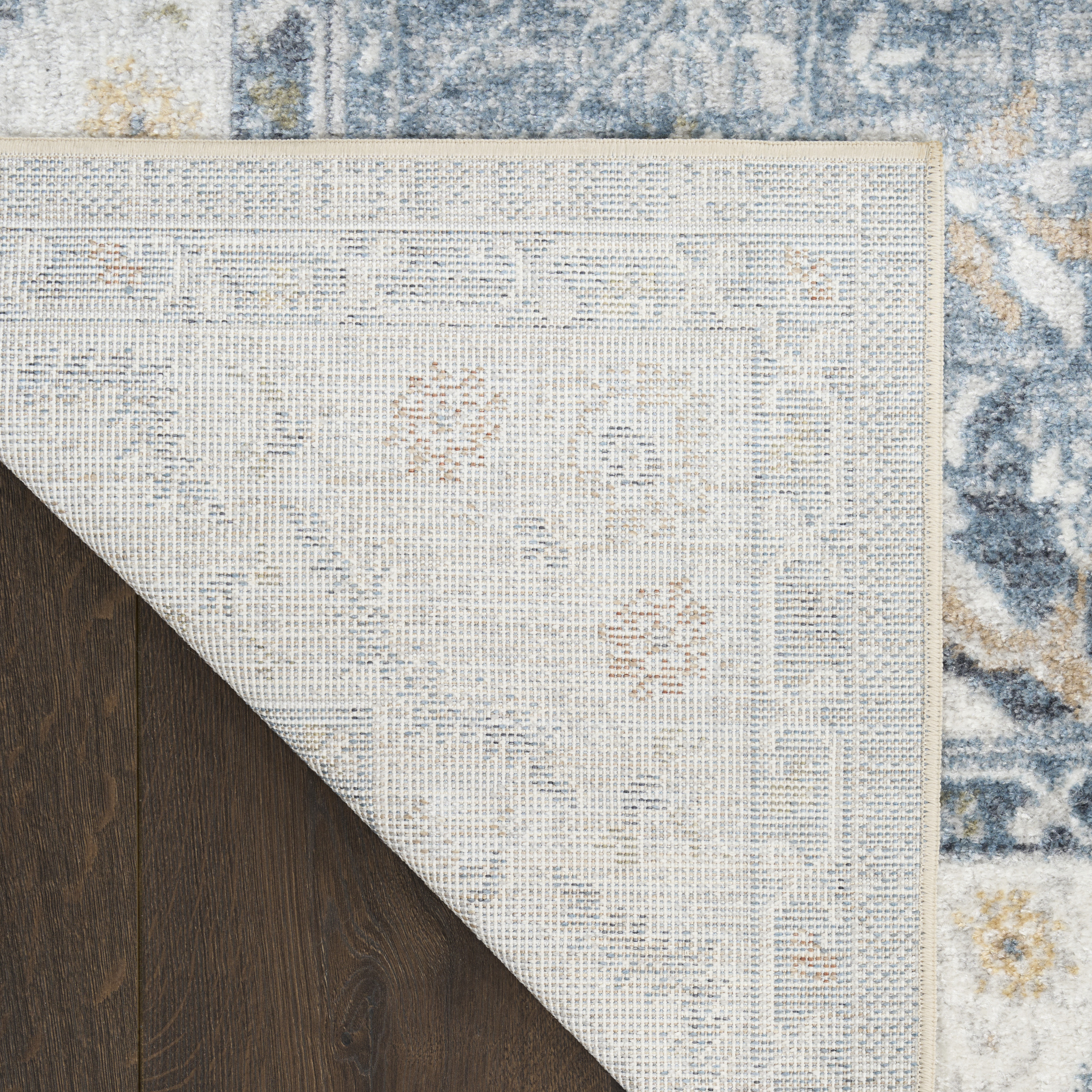 Nourison Astra Machine Washable 6'7" x 9' Blue Vintage Indoor Rug