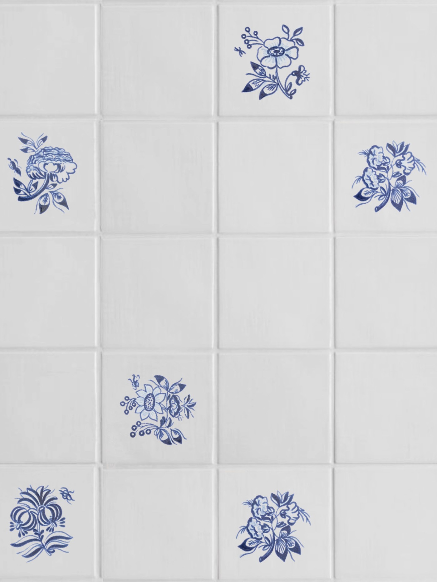 blue and white tiles with floral designs on them.