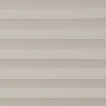 Horizontal beige pleated shades, fully closed with evenly spaced fabric folds, filtering diffuse light; interior setting with neutral tones and no visible view, producing a uniform, muted appearance.