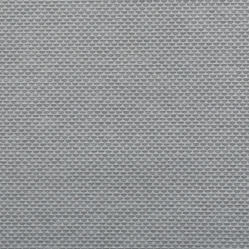 A grey woven roller blind covers the frame, closed and filtering light; tight horizontal weave forming small repeating diamond shapes, likely in an interior window setting with soft diffuse light.