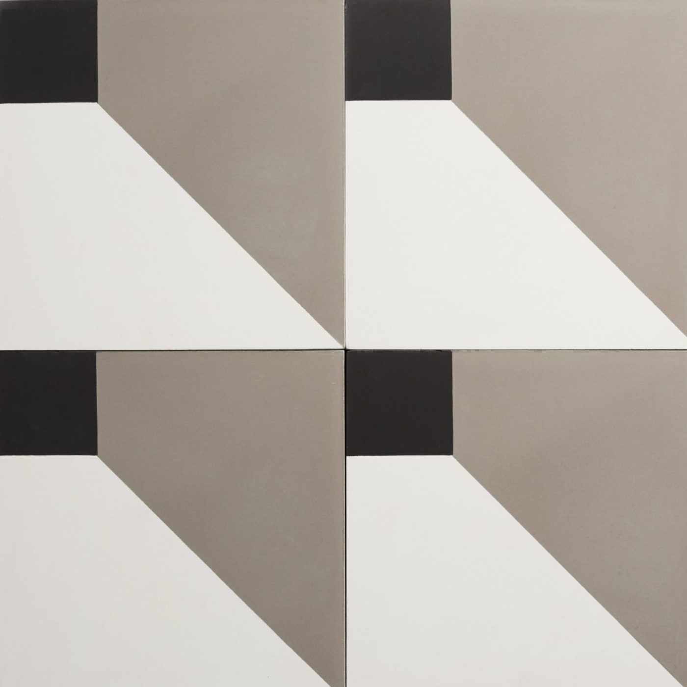 four black, grey and white patterned tiles.