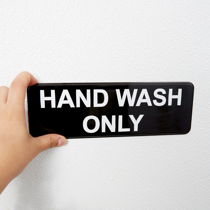 "HAND WASH ONLY" contemporary English symbol sign
