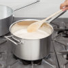 7-quart Intrigue® stainless steel saucepan with helper handle