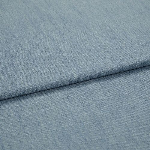 Light-blue woven denim-like fabric, folded diagonally with a shallow overlapping fold; surface shows fine weave and subtle striations, close-up view with soft, even lighting.