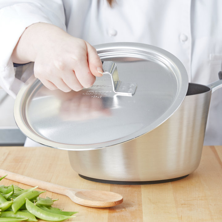 9 13/16-inch Wear-Ever® domed aluminum cover with satin finish and dipped handle