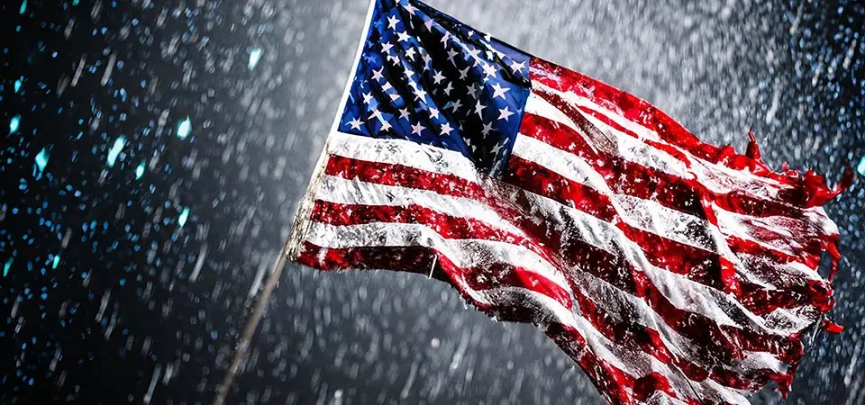 American flag in rain