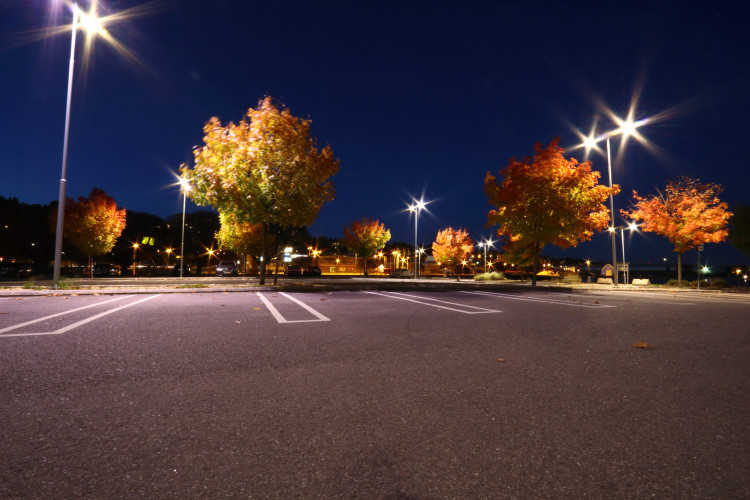 Parking lot with Evolve Outdoor Area Lights and Daintree Wireless Lighting Control WANSI nodes