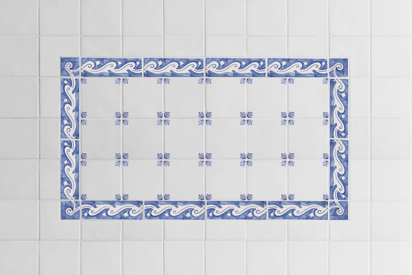 blue and white tiles in a bathroom.