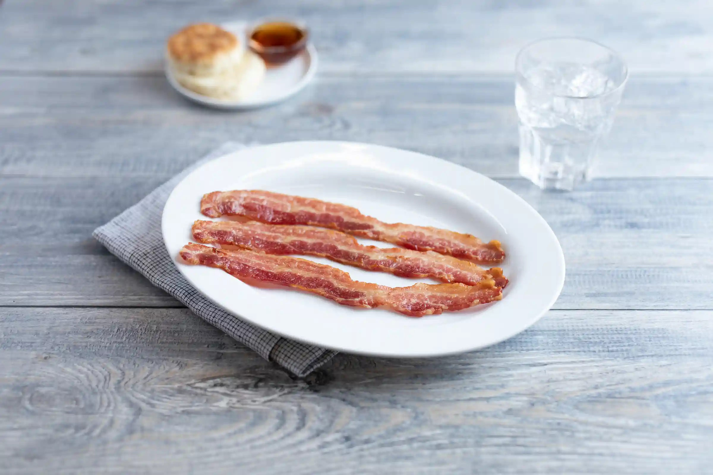 Wright® Brand Naturally Applewood Smoked Thin Sliced Bacon, Bulk, 15Lbs, 18-22 Slices per pound, Gas Flushed https://images.salsify.com/image/upload/s--5nZmqHXC--/q_25/ywb03lyy3zv1mhpsmdba.webp