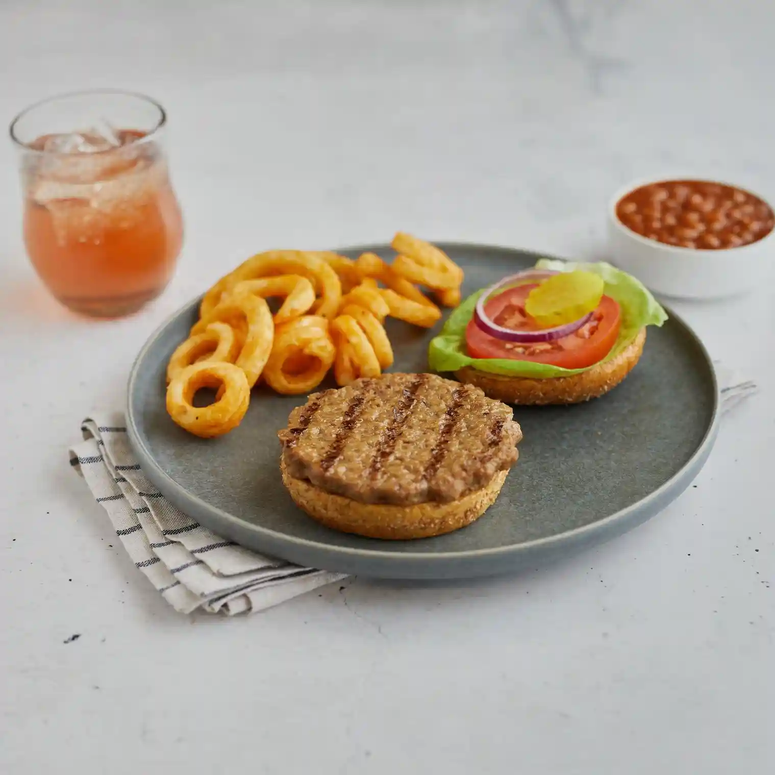 Tenderbroil® Fully Cooked Flame Grilled Beef Patties, 2.30 oz. https://images.salsify.com/image/upload/s--oO7VTBeb--/q_25/t08bu3wdnqncy09tbbrd.webp