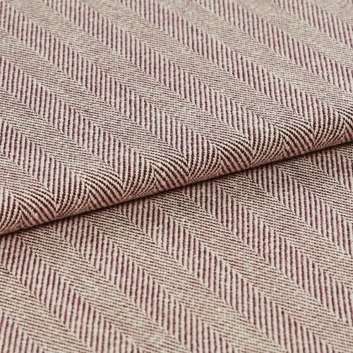 Woven upholstery fabric with beige-and-burgundy diagonal herringbone stripes and ribbed texture; folded and overlapped to reveal the pattern repeat; close-up, evenly lit studio setting.