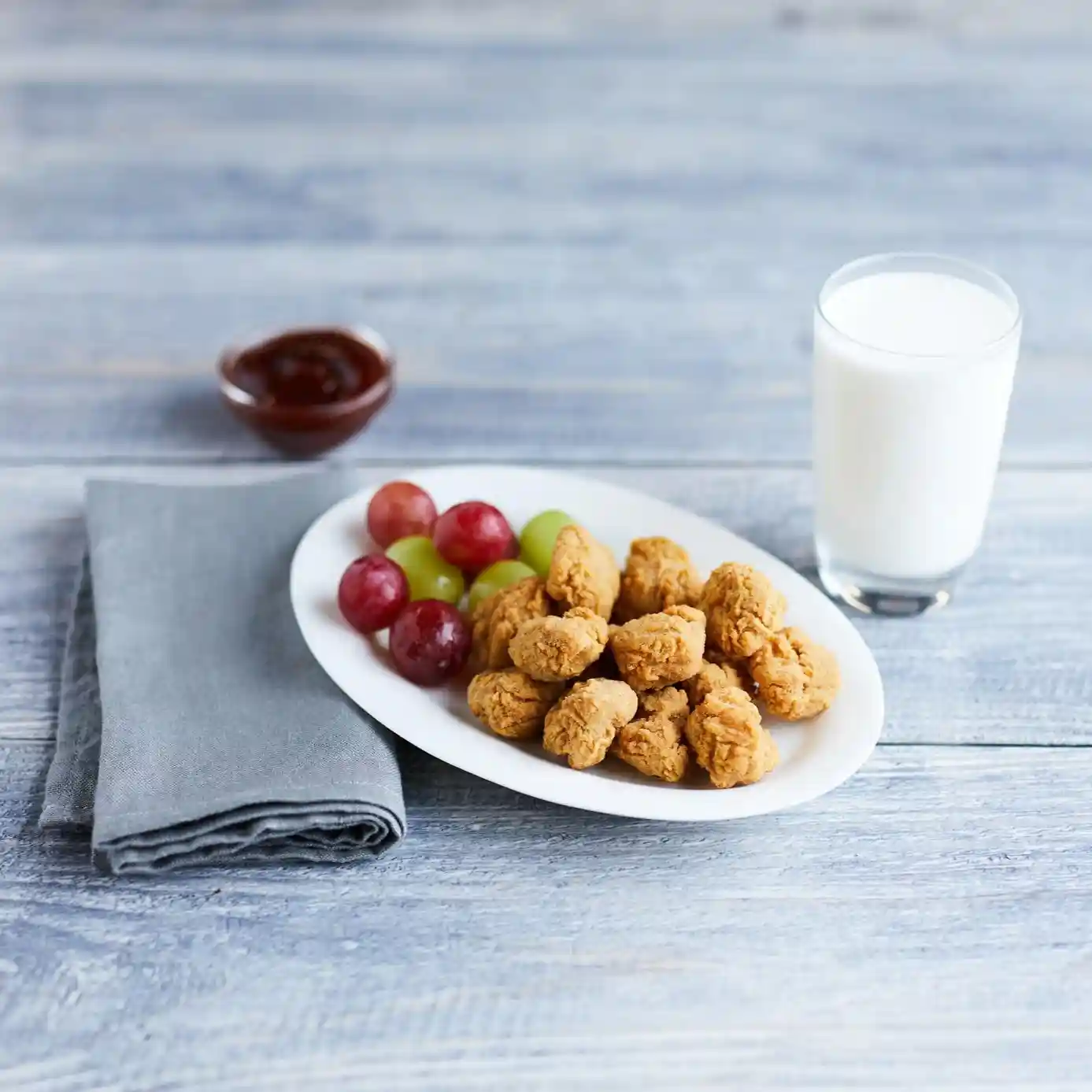 Tyson® Fully Cooked Whole Grain Breaded Popcorn Chicken Bites® Chicken Chunks CN, 0.257 oz. _image_1