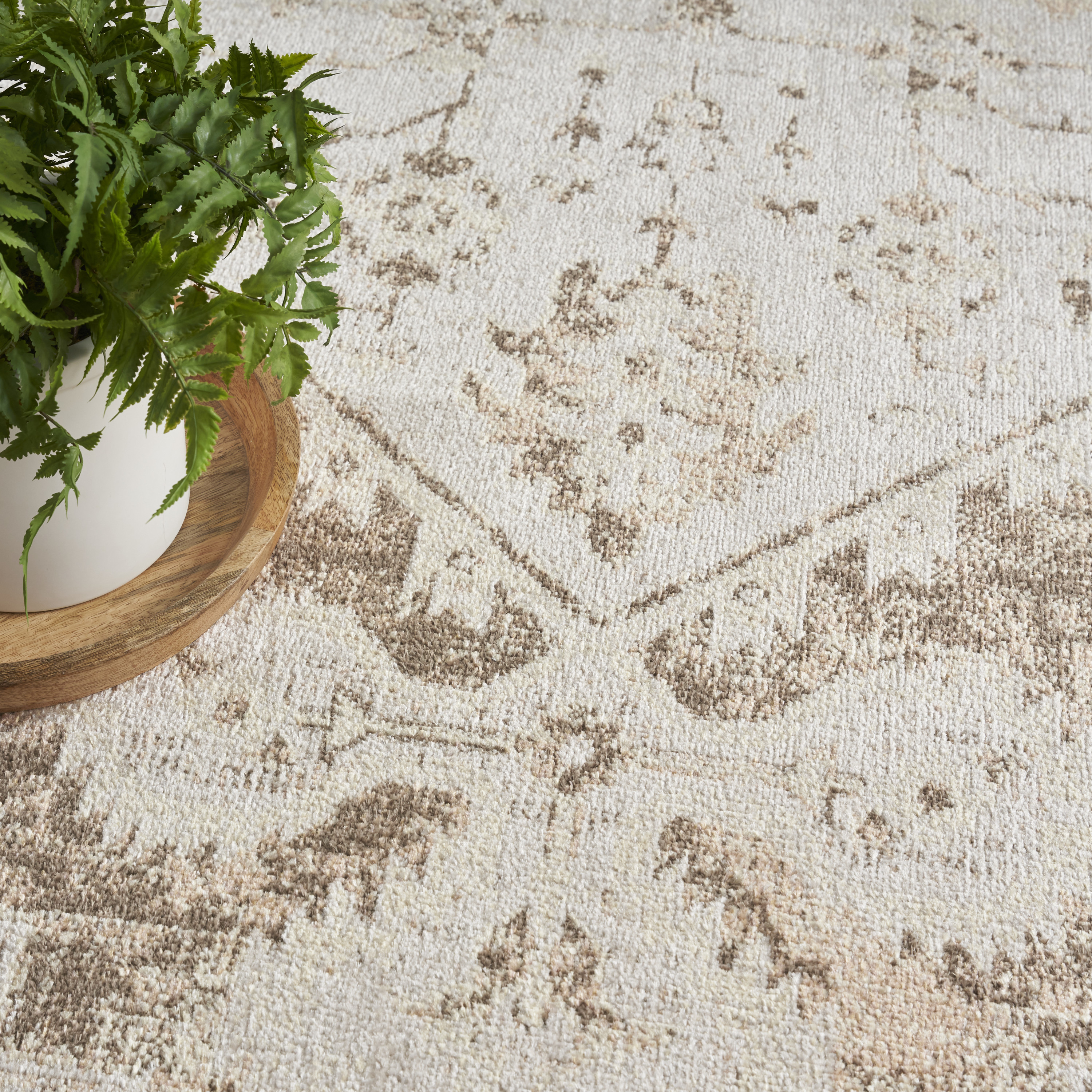 Nourison Astra Machine Washable 6'7" x 9' Beige Vintage Indoor Rug