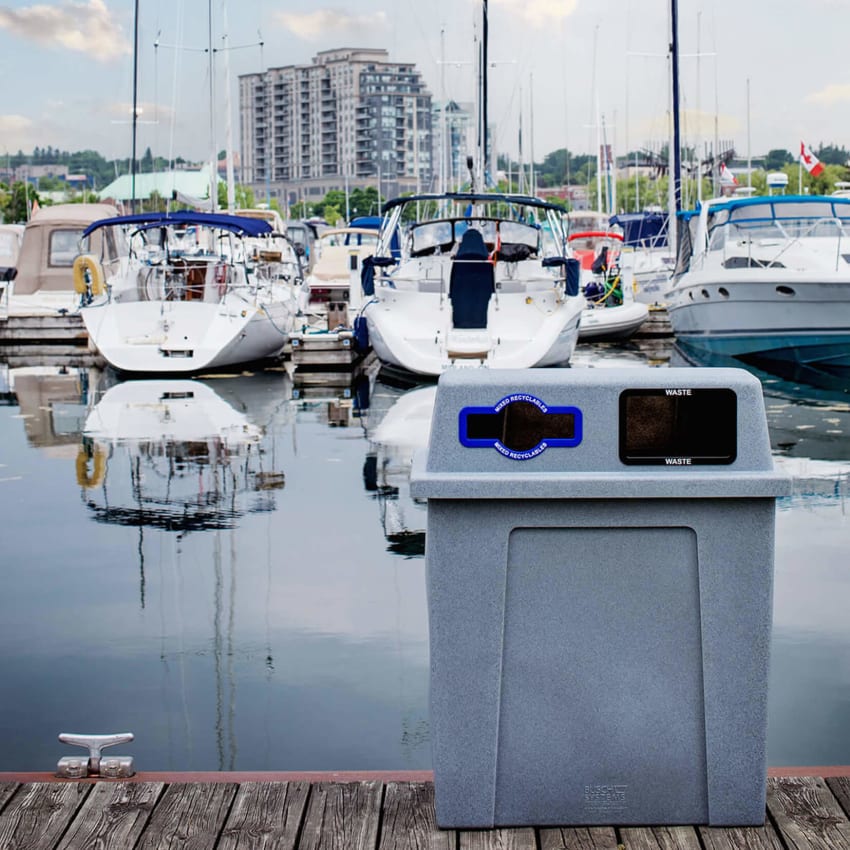 double waste and recyclables bin made from durable LDPE plastic located at a marina at the waterfront