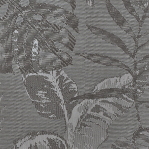 Large tropical leaves overlap, forming a repeating botanical pattern on textured gray woven fabric.