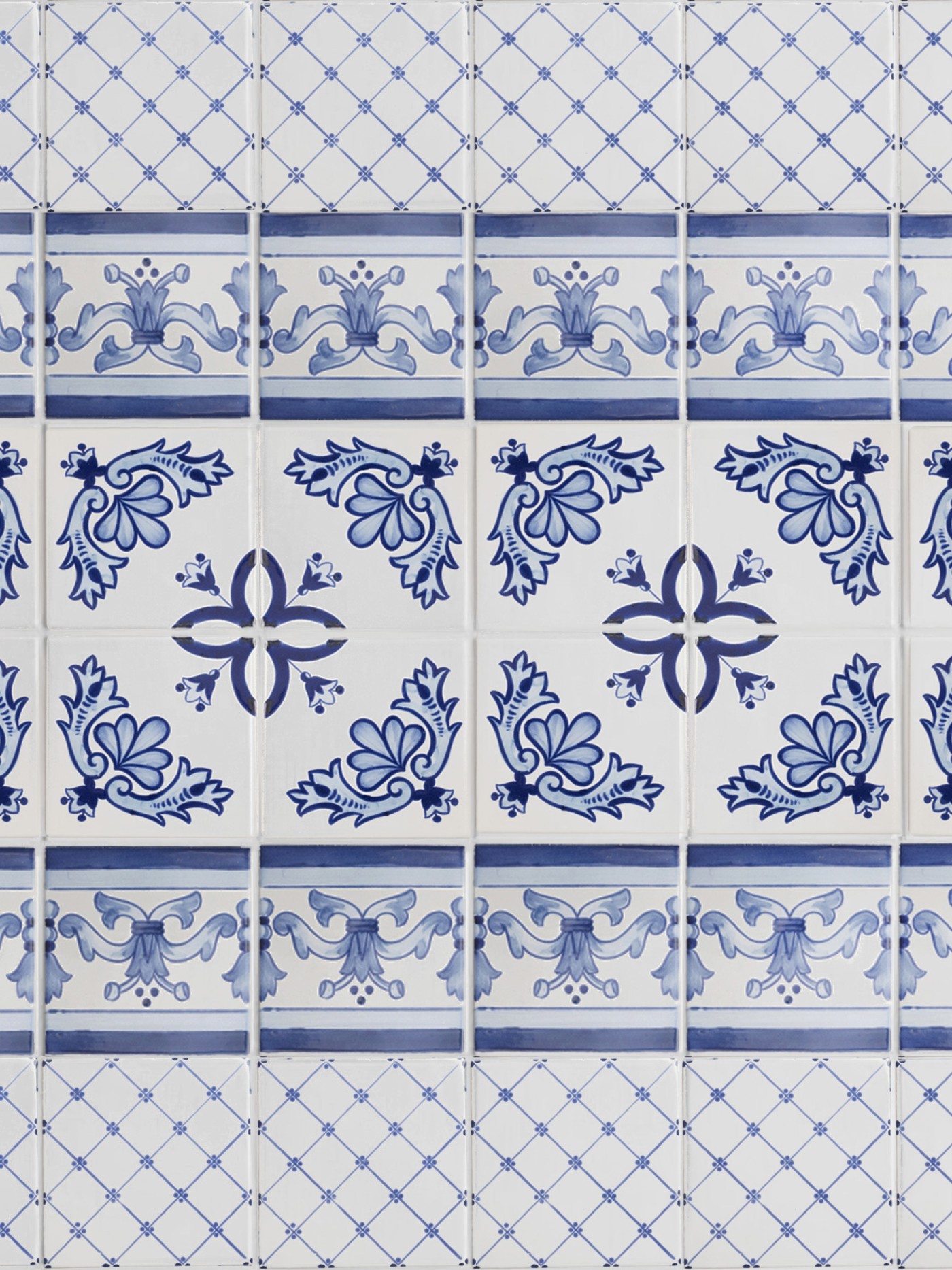 a set of blue and white tiles with floral designs.