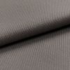 Gray woven fabric (canvas-like), folded diagonally over itself, showing dense pebble and twill textures; soft, even studio lighting highlights fine weave in a close-up, neutral setting.