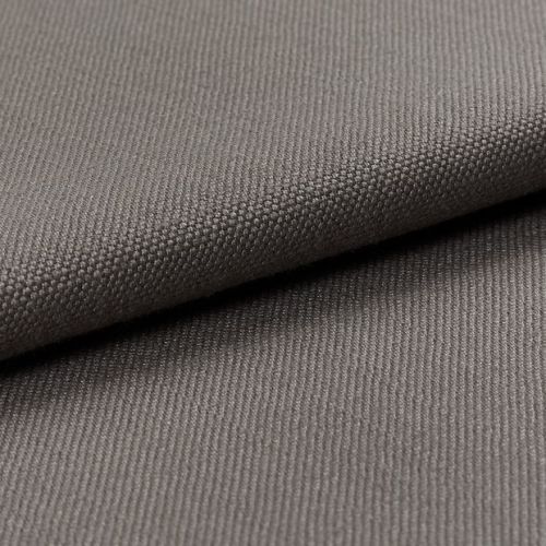 Gray woven fabric (canvas-like), folded diagonally over itself, showing dense pebble and twill textures; soft, even studio lighting highlights fine weave in a close-up, neutral setting.