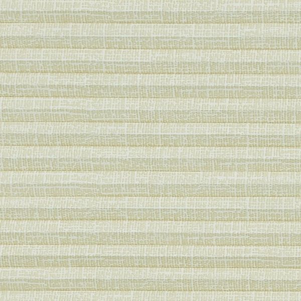 Cream pleated cellular blind with fine woven texture, fully closed, diffusing soft indoor light across a neutral wall in a calm interior.