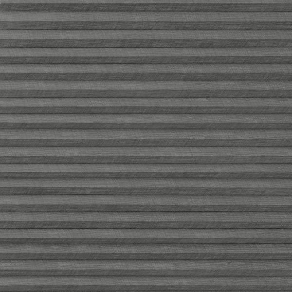Gray pleated fabric blind with horizontal accordion folds — closed and blocking light — fills the window frame, evenly lit interior, no visible view or furnishings.