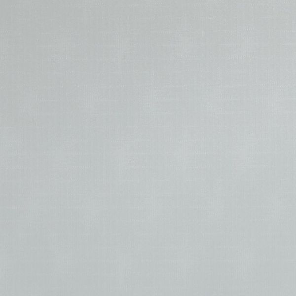 Light-gray fabric panel, fully drawn, smooth with subtle woven texture; blocking view and softly diffusing daylight in an evenly lit interior.
