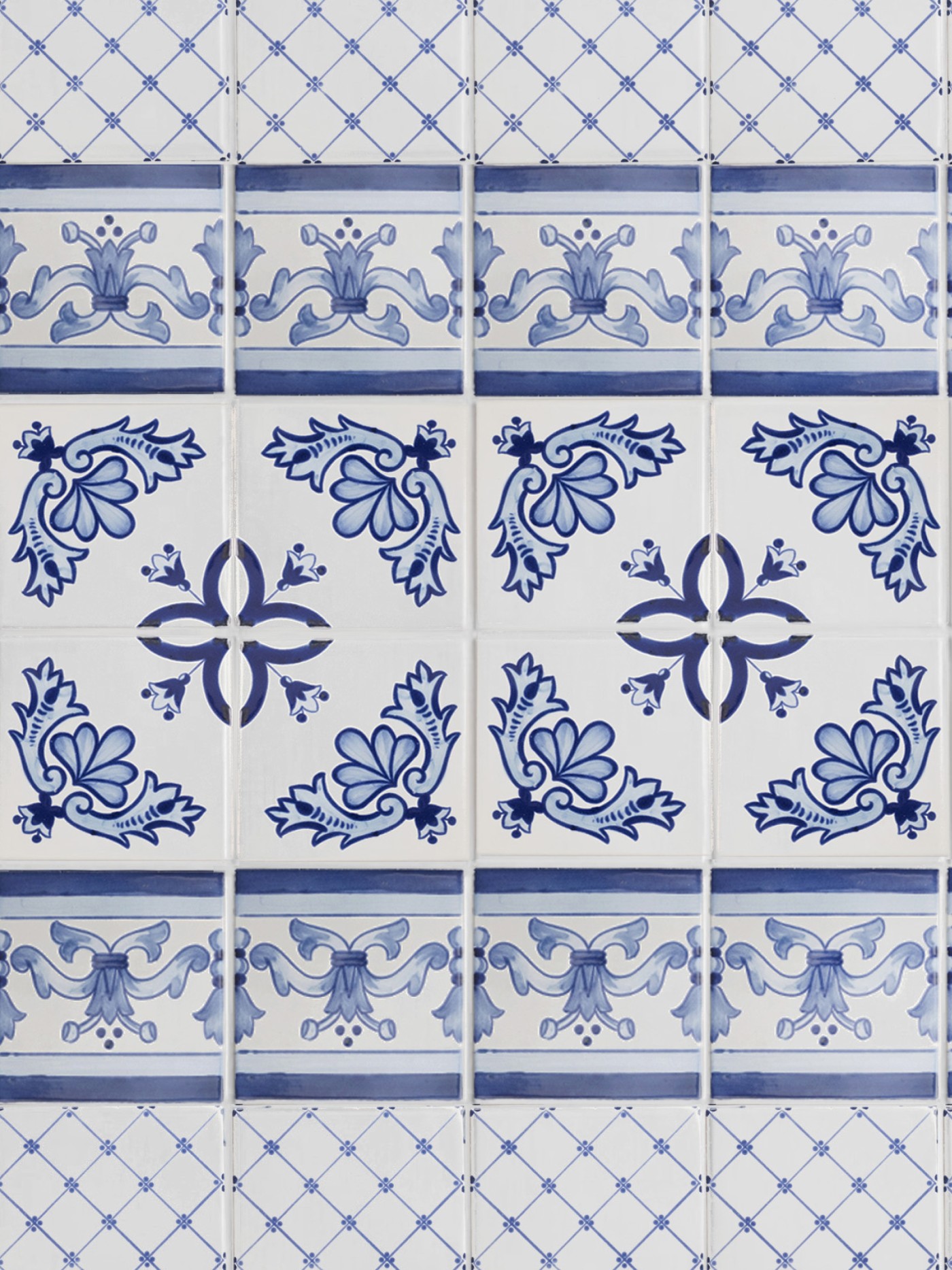 a set of blue and white tiles with floral designs.